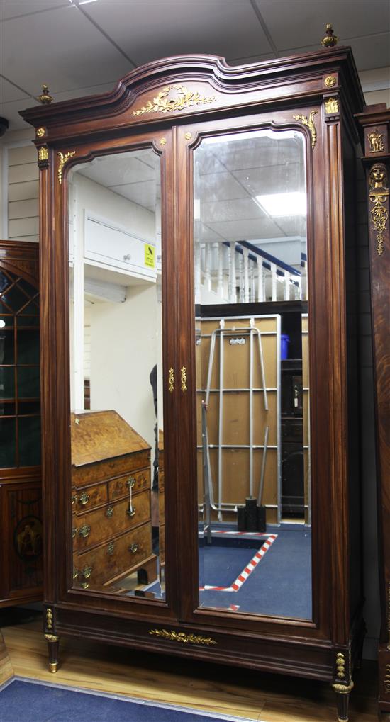 A Louis XVI style ormolu mounted mahogany armoire, 4ft 7ins, depth 2ft, height 8ft